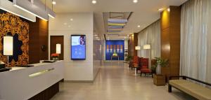 a lobby of a hospital with a waiting room at Nirwana Hometel Jaipur- A Sarovar Hotel in Jaipur