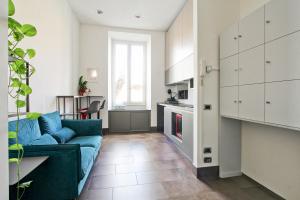 A kitchen or kitchenette at SuitInn19