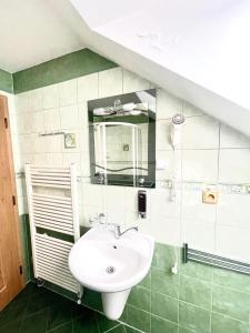 Koupelna v ubytování Penzion a restaurace U Nováků