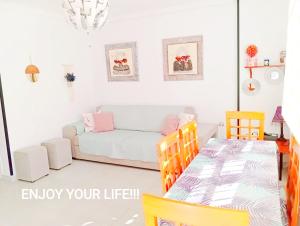 A bed or beds in a room at Bungalow soleado a 100 metros de La Playa
