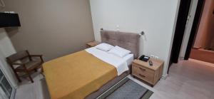 Postel nebo postele na pokoji v ubytování Hotel Antirriο
