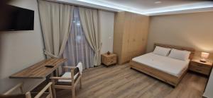 Voodi või voodid majutusasutuse Hotel Antirriο toas