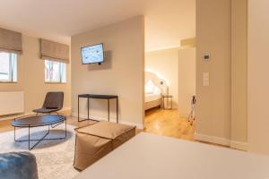TV a/nebo společenská místnost v ubytování Hotel Tuchhaus