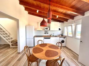 Kuchyň nebo kuchyňský kout v ubytování Eden Gomera Suites