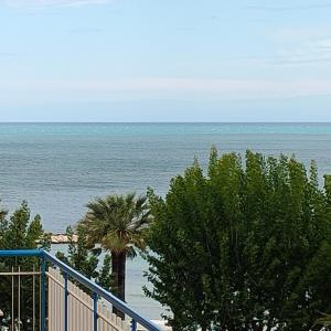 a view of the ocean from a balcony at Ciccimè Sea House in Bari +23 photos