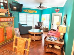 a living room with a couch and a table at Riverfront condo downtown newbraunfels in New Braunfels