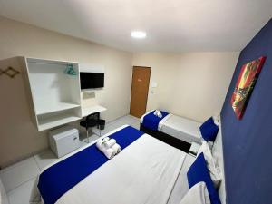 TV a/nebo společenská místnost v ubytování Pousada Costera