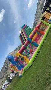 a roller coaster on the grass in a park at Relax in Greci