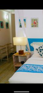 Una cama o camas en una habitación de Esperanza Beach Mawella