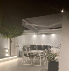 Φωτογραφία από το άλμπουμ του Centraal gelegen luxebungalow στην Πλάγια ντελ Ινγκλές