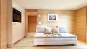 Imhof Alpine B&B Apartments客房内的一张或多张床位