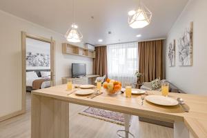 TV a/nebo společenská místnost v ubytování Apart-hotel Ye,s Astana