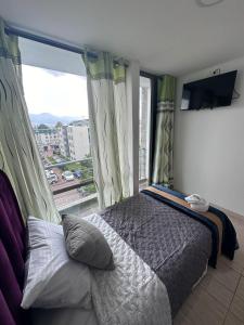 TV a/nebo společenská místnost v ubytování HOSPEDAJE SARY HOUSE + 34 fotografií