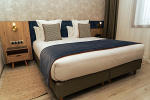 Letto o letti in una camera di Hotel Ben Batouta - Tanger