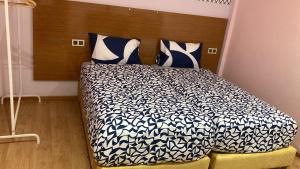 FIFI maison tesisinde bir odada yatak veya yataklar