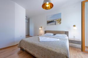 a bedroom with a large bed in a room at Villa Goldie in Polje +42 photos