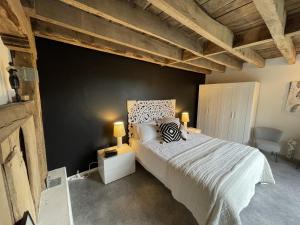Katil atau katil-katil dalam bilik di Dordogne et Corrèze vacances BnB