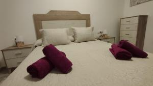 Postel nebo postele na pokoji v ubytování Apartamentos Séneca junto al Centro