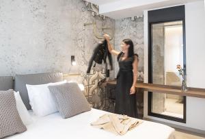 Postel nebo postele na pokoji v ubytování Panorama Hotel Friuli - Boutique Hotel