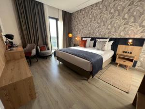 Letto o letti in una camera di Hotel Ben Batouta - Tanger