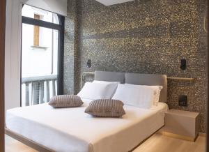 Postel nebo postele na pokoji v ubytování Panorama Hotel Friuli - Boutique Hotel