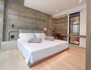 Postel nebo postele na pokoji v ubytování Panorama Hotel Friuli - Boutique Hotel