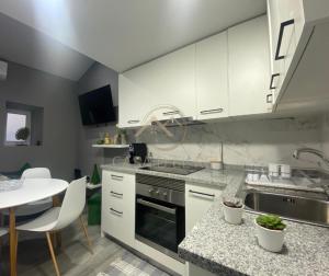 A cozinha ou cozinha compacta de Casa D`El Rei