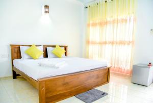 Giường trong phòng chung tại Paddy Field View Resort