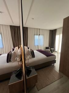 Letto o letti in una camera di Hotel Ben Batouta - Tanger
