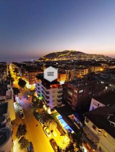an overhead view of a city at night at Kadeer Hotel in Alanya