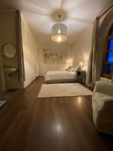 Postel nebo postele na pokoji v ubytování Auberge de Corsas + 7 fotografií