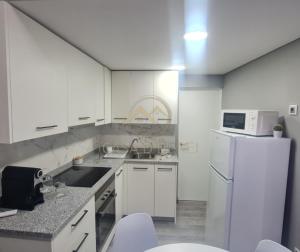 A cozinha ou cozinha compacta de Casa D`El Rei