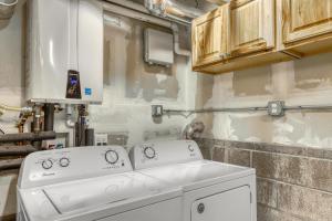 a kitchen with a washing machine in a room at Black Bear Hideaway in South Lake Tahoe +24 photos