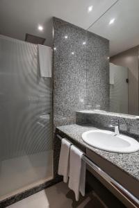 Koupelna v ubytování Orla Copacabana Hotel