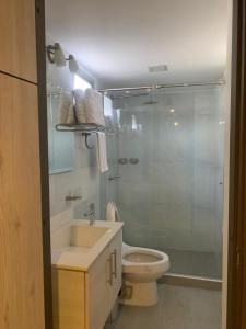 Ett badrum på Hotel Dibeni Pereira