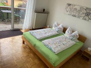 Postel nebo postele na pokoji v ubytování Ferienwohnungen Scheuring 1.OG