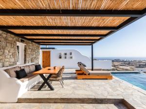 Гостиная зона в Villa Evi & Suites