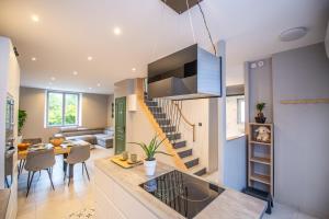 Khu vực ghế ngồi tại L'escapade Passionnée-Balnéo-Clim-Maison moderne