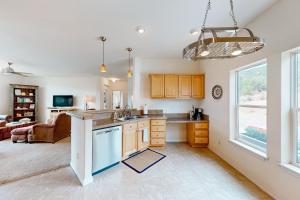 a kitchen with a sink and a counter top at Cottonwood Pass Retreat in Gypsum