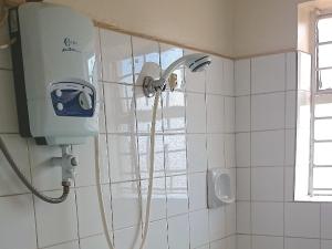 Ванна кімната в Hotel Acacia City