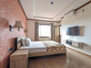 Кровать или кровати в номере Tranquil Retreat in Kathmandu