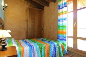 Postel nebo postele na pokoji v ubytování Mirador de Campumedra + 1 fotografie