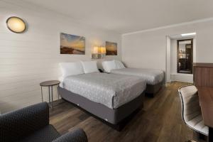 Atlantic Oceanside Dewey客房内的一张或多张床位