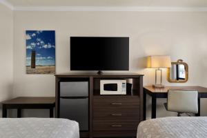 Atlantic Oceanside Dewey客房内的一张或多张床位