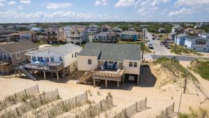 an aerial view of a house on a beach at OCEANFRONT, Ocean views, Dogs Welcome! KH10, Beach House in Kitty Hawk