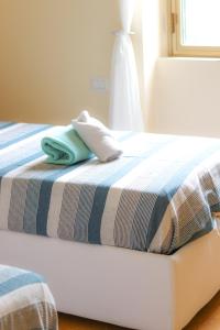 Ένα ή περισσότερα κρεβάτια σε δωμάτιο στο Home Sweet Home