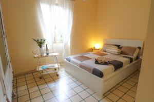 Ένα ή περισσότερα κρεβάτια σε δωμάτιο στο Home Sweet Home