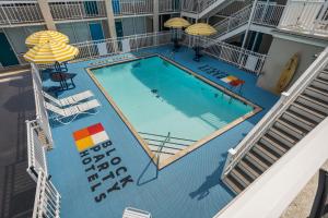 an overhead view of a swimming pool on a building at Atlantic Oceanside Dewey in Dewey Beach