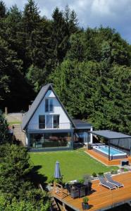 an aerial view of a house with a swimming pool at Panoramic view Cottage house - Heaven in Pohorje