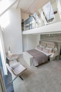 Postel nebo postele na pokoji v ubytování Boutique Hotel Herman K